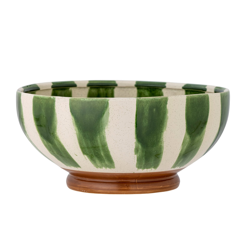 Ceramic bowl with green and white striped pattern on a white background