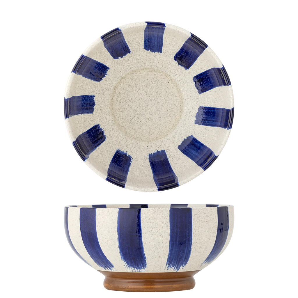 Ceramic bowl with blue stripes on a white background