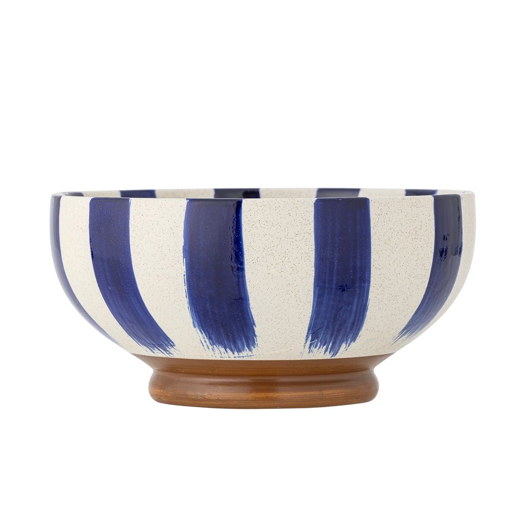 Ceramic bowl with blue and white striped design on a white background