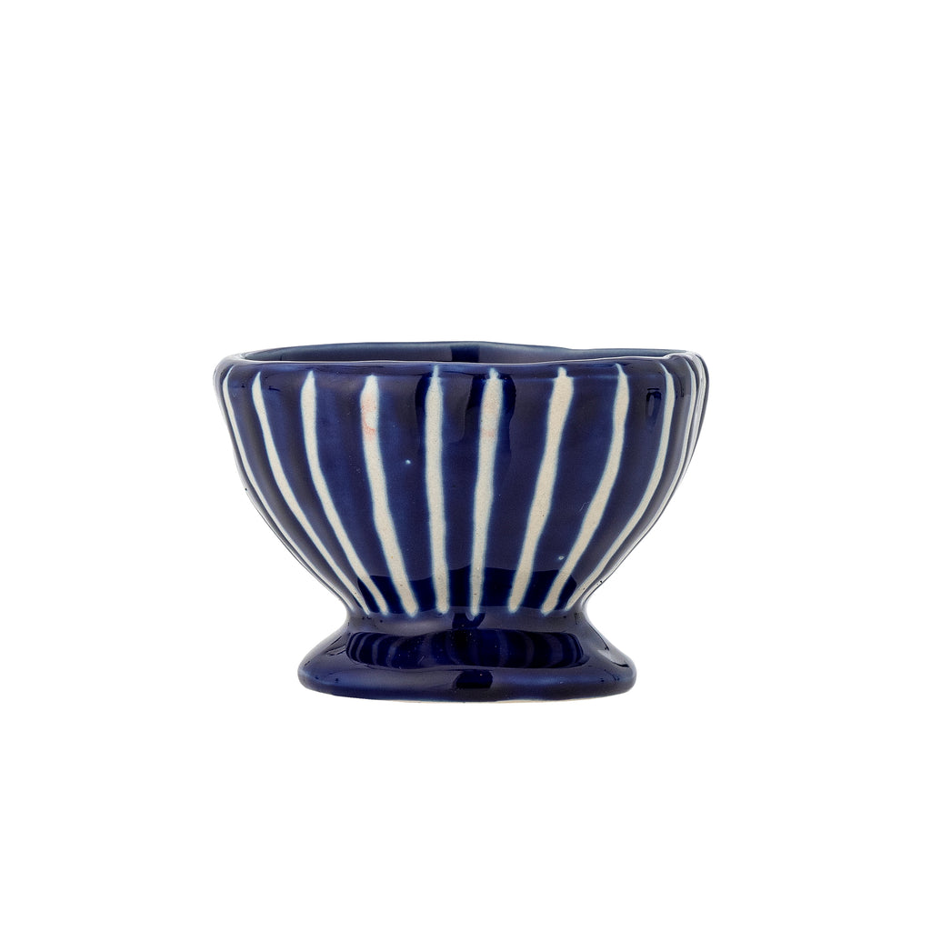 Blue ceramic bowl with white stripes on a white background