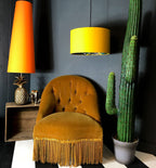 Our kooky Lemur animal print lampshade surrounded in in egg yolk cotton Handmade Lampshades made to order by Love Frankie.