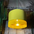 Love Frankie banana cotton lampshade gold lining and fringing light on