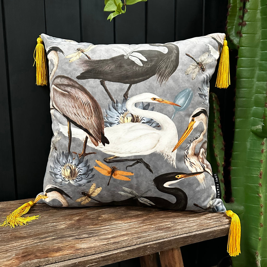 Love Frankie bird song velvet cushion in soft grey with yellow tassels