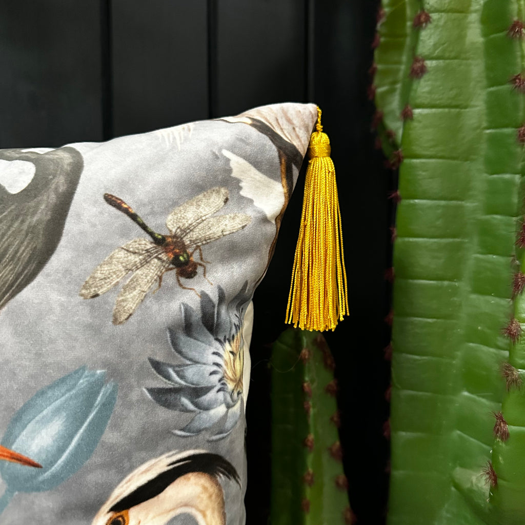 Love Frankie bird song velvet cushion in grey with yellow tassels