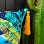 Love Frankie rainforest velvet cushion with yellow tassels