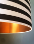 Close up of our circus stripes and gold lining lampshade