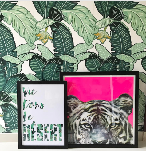 The standout Feuilles De Luxe Banana Leaf Wallpaper from Loft And Us and this punchy Tiger Print from Nelly Duff. 