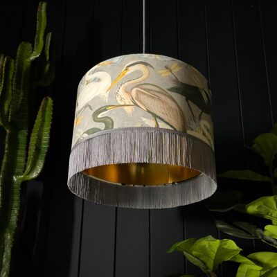 The Tranquil Bird Song Heron Lampshade With Fringing And Gold Lining