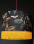 Handmade Fringed Velvet Lampshade in Carbon Black and Sunshine Yellow Fringing Light On
