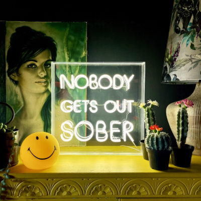 love-frankie-nobody-gets-out-sober-neon-light
