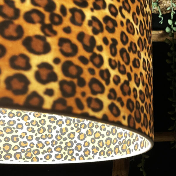 Leopard Print Silhouette Lampshade in Crisp White CottonLeopard Print Silhouette Lampshade in Crisp White Cotton Close Up Light on