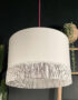 Crisp White Leopard Print Silhouette Lampshade with White Fringing with the light off