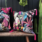 Love Frankie acid jungle velvet cushion with raspberry tassels