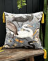 Love Frankie bird song velvet cushion in grey with yellow tassels
