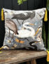 Love Frankie bird song velvet cushion in soft grey with yellow tassels