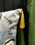 Love Frankie bird song velvet cushion in grey with yellow tassels