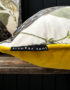 love-frankie-mythical-plumes-parchment-velvet-cushion-piping-close up