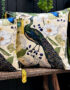 Love Frankie mythical plumes velvet cushion in parchment with yellow tassels