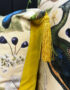 love-frankie-mythical-plumes-parchment-velvet-cushion-tassles-close-up