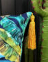 Love Frankie rainforest velvet cushion with yellow tassels