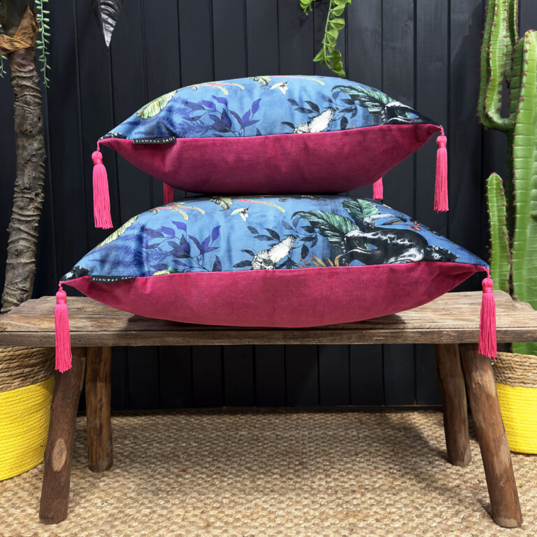 DEADLY NIGHT SHADE CUSHION IN SMOKE WITH RASPBERRY PIPING – MEDIUM