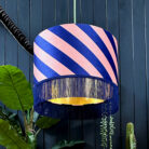 love frankie Helter Skelter lampshade in peach fuzz with gold lining and fringing