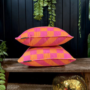 Tutti Frutti Pink and Orange Reversible Checkmate Checkerboard & Helter Skelter Stripe Cushions